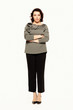 Full length of serious woman in a gray blouse posing while standing with arms crossed, isolated on white background