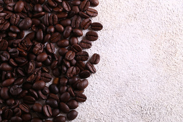 natural organic coffee beans on a light background