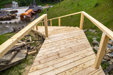 New Wooden Stairs Outdoors. Carpenters Work.