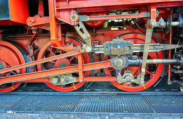 Detail of the drive of a steam locomotive at the train station.