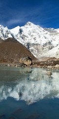 Canvas Print - Mount Cho Oyu reflecting in lake