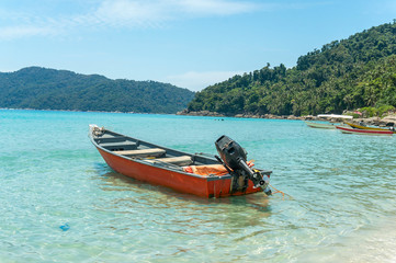 Wall Mural - Boats with clear water and blue skies at Perhentian Island, Malaysia