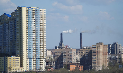 Wall Mural - Pipes smoke, polluting the air in the city, worsening the environment