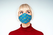 Pensive,  Thoughtful Woman Wearing Protection Handmade Face Mask During The Quarantine Of Coronavirus Infection Outbreak. Copy, Empty Space For Text