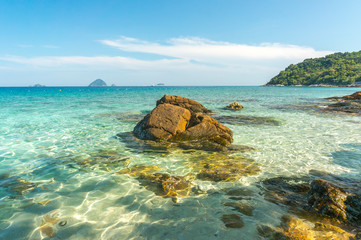 Wall Mural - Beach rock with clear water