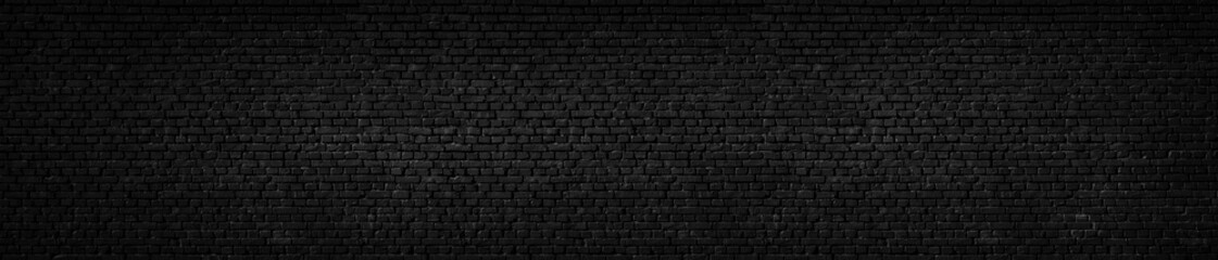 Wall Mural - texture of a black painted brick wall as a background or wallpaper