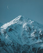 © Charlee Wild - Snowcapped mountain peak against sky