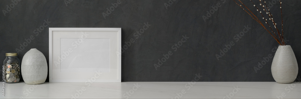 Cropped shot of modern workspace with copy space and decorations on marble table - obrazy, fototapety, plakaty 