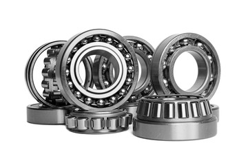 Set of various  roller bearing on white background isolated. Metal  autotechnology background.  Part of the car