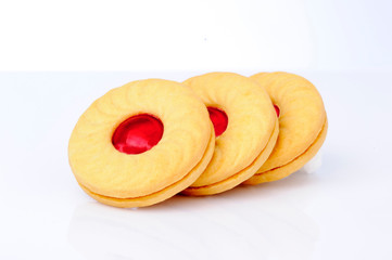 Red strawberry biscuit on white background