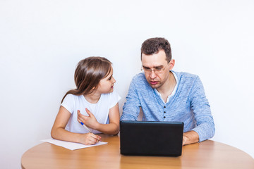 dad and daughter learn via the Internet, remote learning, family help, mom, relatives, time of quarantine and vacation, self-isolation, Skype, use of technology