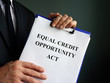 © Vitalii Vodolazskyi - Lawyer shows Equal Credit Opportunity Act ECOA.