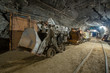 © Mishainik - Ore loading machine eimco in underground gold mine tunnel