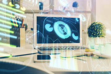 multi exposure of desktop computer and technology theme hologram. concept of software development.