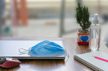 Work from home with a sterilized mask. during the detention, Covid-19 in a medical mask the concept of stopping the spread of the virus