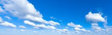Panoramic Fluffy Cloud In The Blue Sky. Sky With Cloud On A Sunny Day.