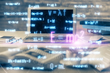 Desktop computer background and formula hologram writing. Double exposure. Education concept.