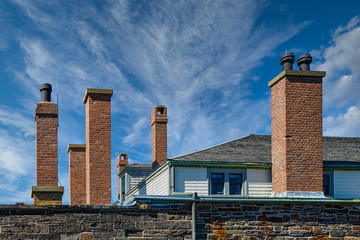 Sticker - An old stone fort in Halifax, Nova Scotia under blue skies