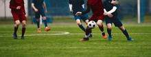 Horizontal Picture Of Soccer Match. Soccer Football Players Competing For Ball And Kick Ball During Match In The Stadium. Footballers In Action On Soccer League Game. Senior Level Sport Competition