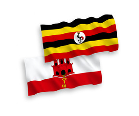 Flags of Uganda and Gibraltar on a white background