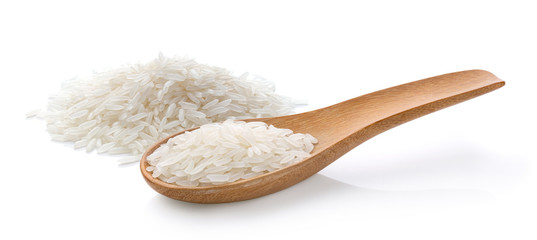 Dry white rice in wood spoon on a white background