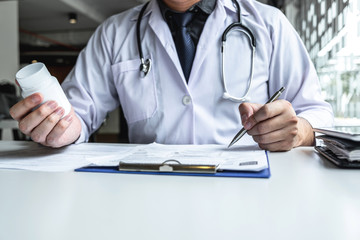 Wall Mural - Doctor having conversation with patient while discussing explaining symptoms or counsel diagnosis health and consult treatment of disease, healthcare and assistance concept