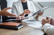 © Ngampol - Employer reading a resume with talking during about profile of candidate