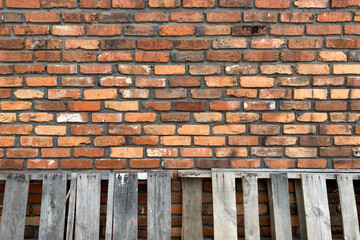 Wall Mural - vintage old red brick wall leaning weathered pallets