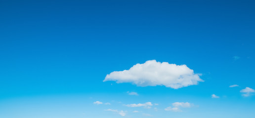 small white cloud in the blue sky