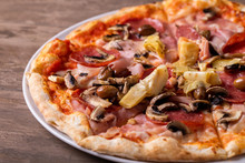 Details Of Tasty Ham Salami And Mushrooms Pizza