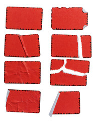 high res macro photo of cool set of red paper stickers isolated on white background with tears or snags and folds, matt crumpled stickers.