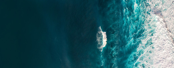 Wall Mural - aerial view to waves in ocean