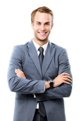 Portrait of happy smiling young handsome confident businessman in grey suit, isolated over white background. Business success concept.