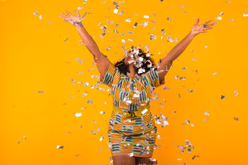 Party, holidays and birthday concept - Celebrating happiness, young woman dancing with big smile throwing confetti