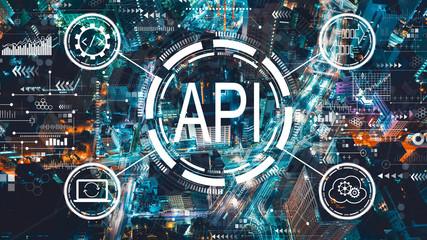 api - application programming interface concept with aerial view of tokyo, japan at night
