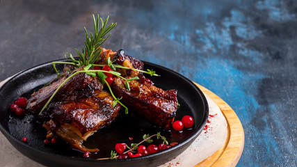 Wall Mural - Grilled pork ribs with barbeque sauce. Copy space