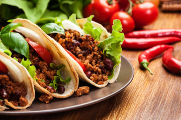 Wall Mural - Mexican tacos with minced meat, beans and spices