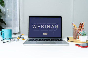 work from home with laptop computer for online training webinars. e-learning browsing connection and