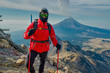 © Nailotl - Hiker watches Volcano Popocatepetl erupt trekking in Iztaccihuatl Popocatepetl National Park, Mexico