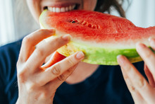 Young Adult Woman Eating Watermelon Fruit