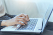 © Nature Peaceful  - hands typing on laptop