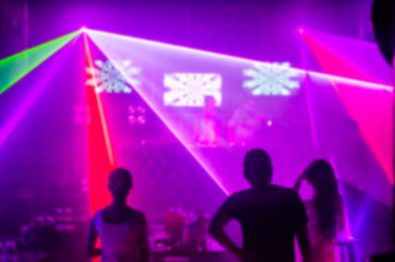 Abstract blur Light And Silhouette in club party is blurred for background