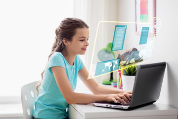 education, school and technology concept - girl with laptop computer and hologram projection learning nature online at home