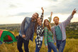 © Studio Romantic - Friends hikers smiling on nature in the evening at sunset.