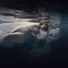 Woman In A Sequin Dress Underwater