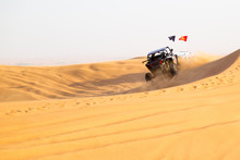 Sports Rally In The Sand Dunes Of The Desert. Desert Rally Sports Race. Sand Cloud