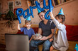 © Maria - Happy father with two sibling celebrating birthday via internet in quarantine time, self-isolation