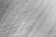 crosshatch brushed metal background. steel metal with sharp scratches