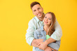 © Pixel-Shot - Happy young couple on color background
