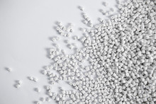 Polypropylene Granule Close-up Background Texture. Plastic Resin ( Masterbatch).Grey Chemical Granules For Industrial Plastic Production